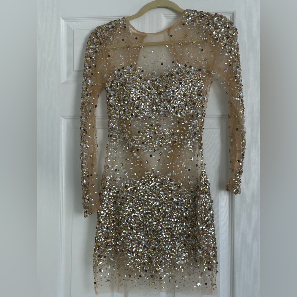 Jovani beaded dress
Gently used
Perfect condition size 0